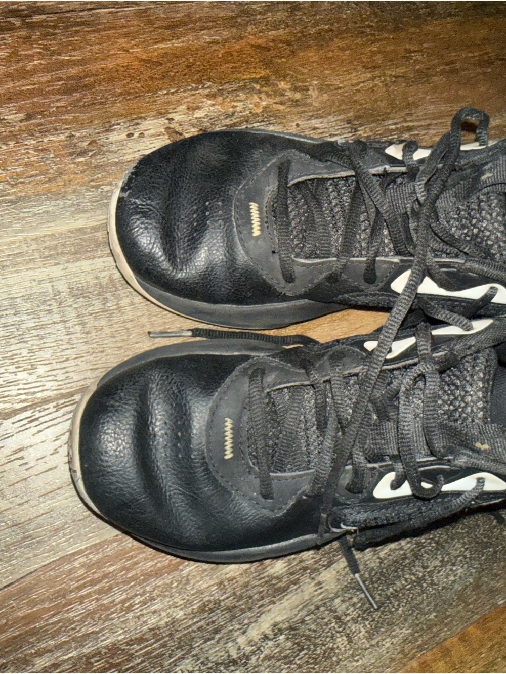Under Armour Black Kids Athletic Sneakers with White Accents